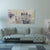 Modern living room with a sofa, coffee table, and wall art.